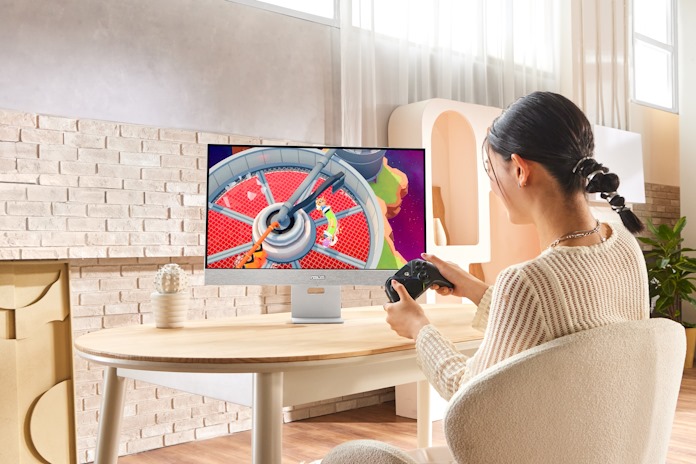 A young woman playing games using a smart monitor