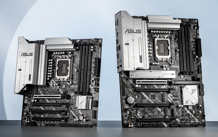 Two ASUS Prime motherboards standing upright next to each other