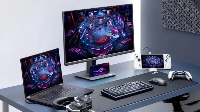 A full gaming setup featuring the ROG Strix XG27ACD, one of the best gaming monitors from ROG Strix