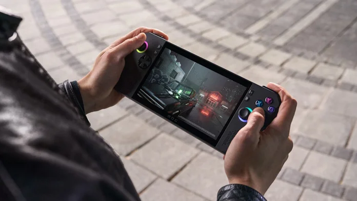 A gamer holding the ROG Ally X handheld