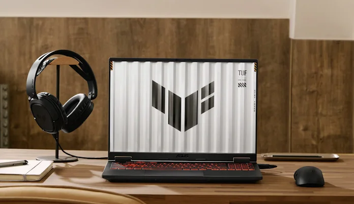 The TUF Gaming A16 laptop with a headset and a mouse