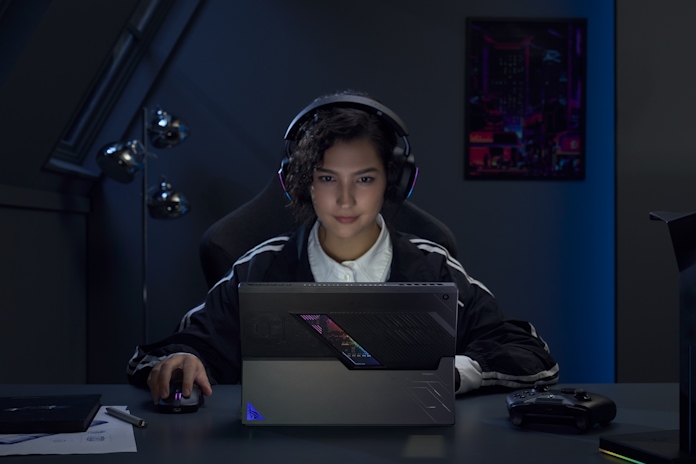 A young woman using the 2025 ROG Flow tablet