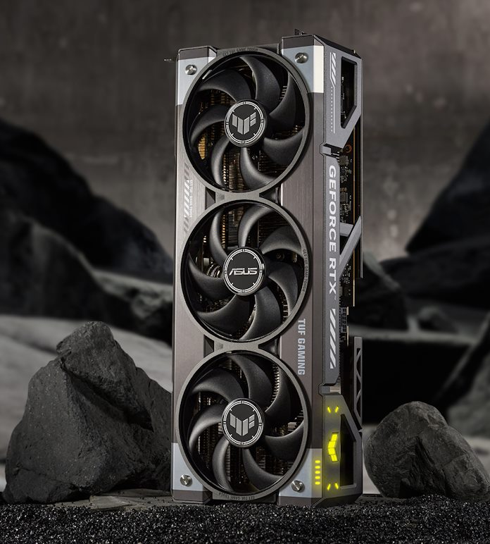 The TUF Gaming GeForce RTX 5090 standing on end on a rocky surface