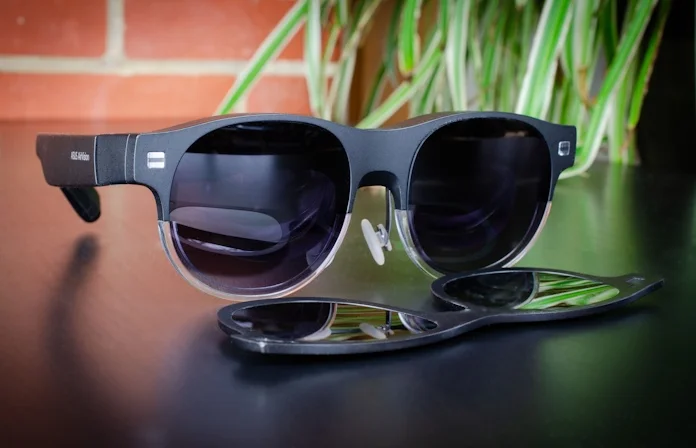 The AirVision M1 smart glasses and their optional snap-on shades