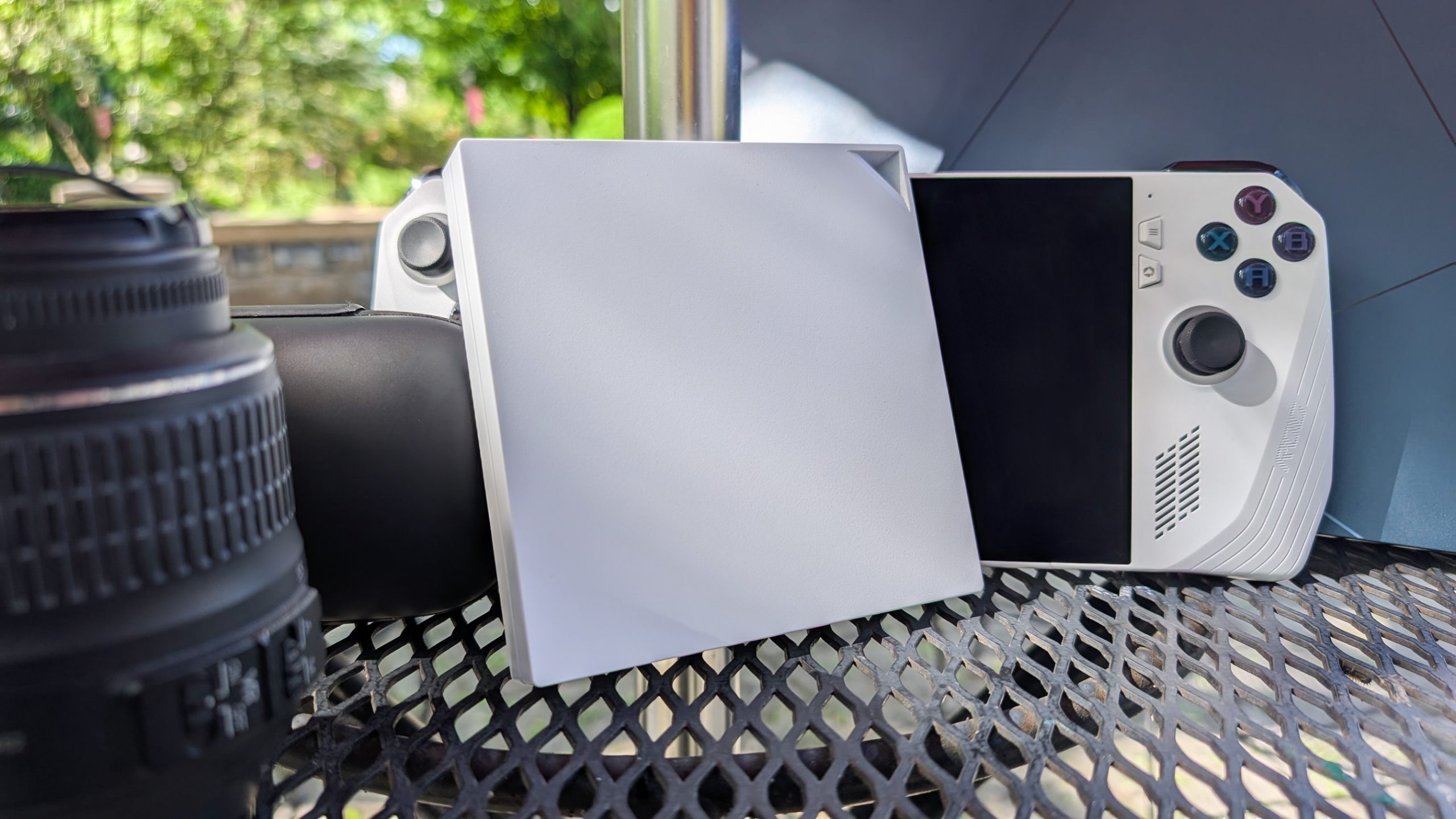 A variety of ASUS traveling gear on a cafe table