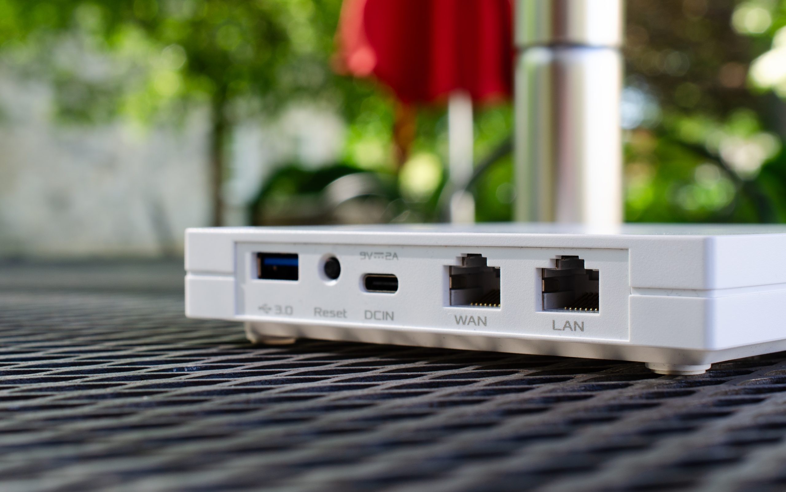 The rear I/O options of the ASUS RT-AX57 Go travel router