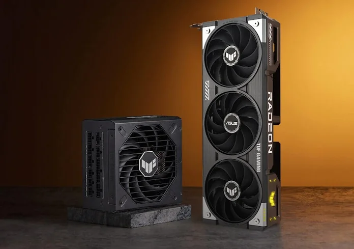 A TUF Gaming Radeon RX 9060 XT graphics card and a TUF Gaming power supply on a table