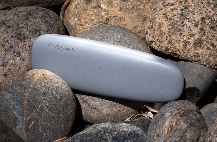 The ASUS Cobble portable SSD enclosure on a pile of rocks