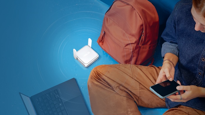 An ASUS RT-BE58 Go travel router next to a young person's backpack 