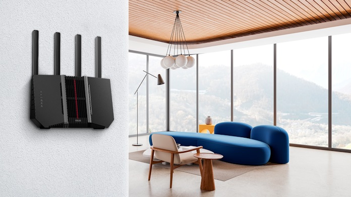 The ASUS RT-BE92U extendable router on the wall of a family room