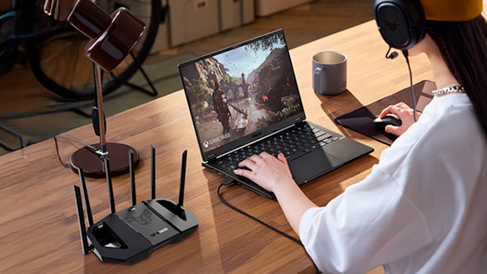 The TUF Gaming BE6500 on a desk with other TUF Gaming gear
