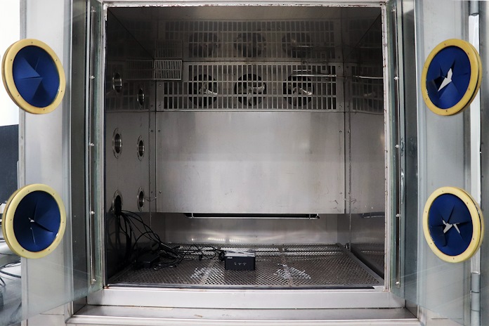 An ASUS NUC in a chamber that allows for temperature and humidity testing
