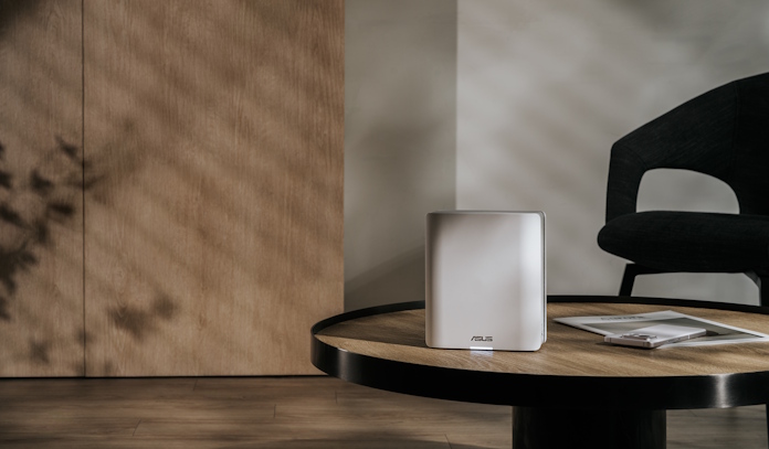 ZenWiFi B10 mesh router on an end table