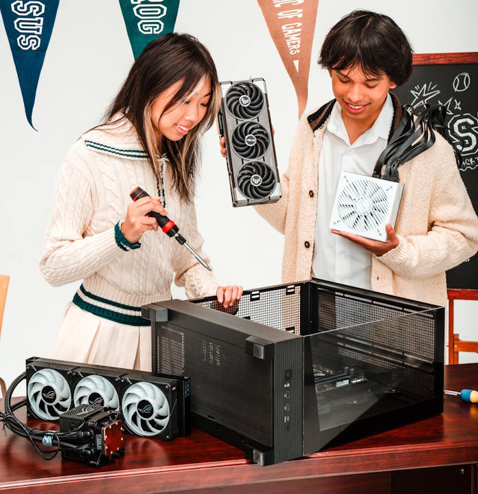 Two young people building a PC