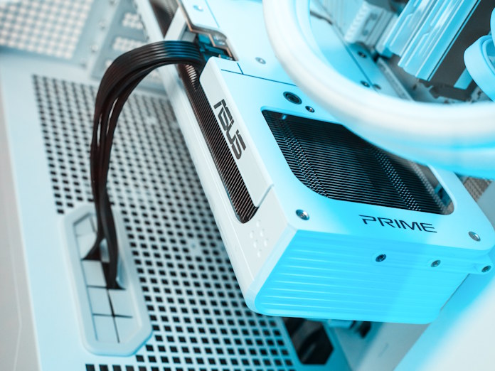 A closeup view of a white ASUS graphics card