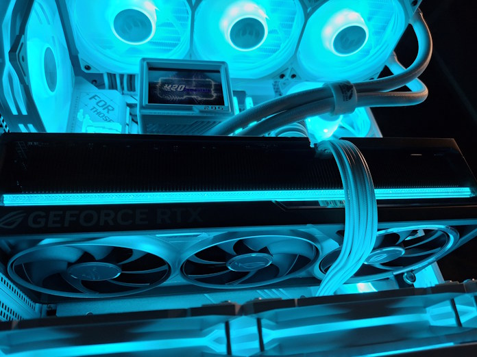 A closeup view of the graphics card and AIO CPU liquid cooler in this build from H2O computers