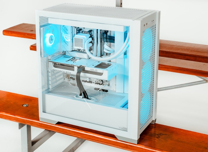 A completed white-themed PC on bleachers
