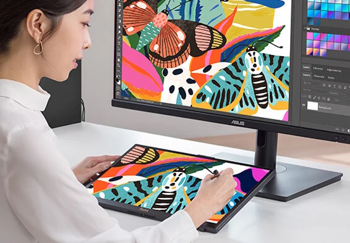 A digital artist uses a high-PPI monitor to draw