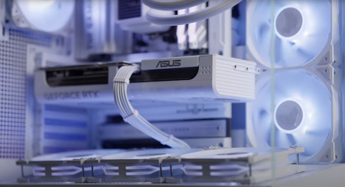A graphics card installed in a white PC build