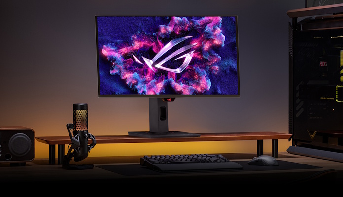 The ROG Strix OLED XG27UCDMG gaming monitor on a desktop gaming setup