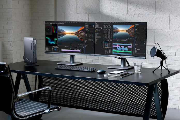 A multi-monitor setup featuring an ASUS NUC and the ProArt PA27JCV monitor