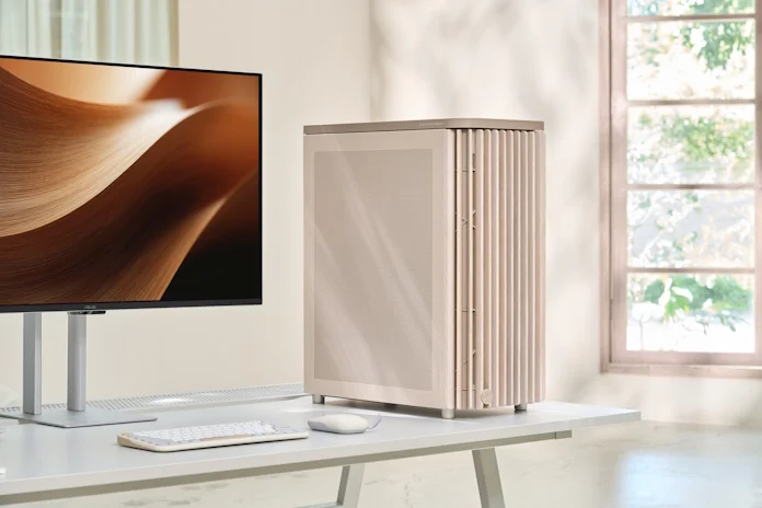 The ProArt PA401 Beige Edition on a desk with other creative gear