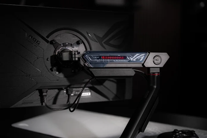 A view of the ROG Ergo Monitor Arm attached to a gaming monitor