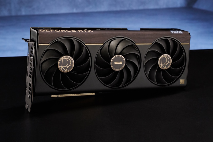 A ProArt GeForce RTX 5080 graphics card on a table against a blue background