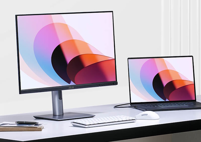 The ProArt Display PA278QV Gen 2 creative monitor on a desk with a ProArt laptop and ROG peripherals