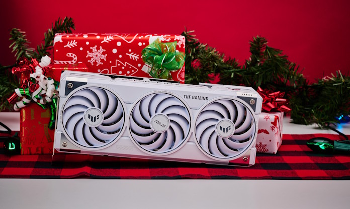 The TUF Gaming GeForce RTX 5070 Ti graphics card against a background of wrapped holiday presents